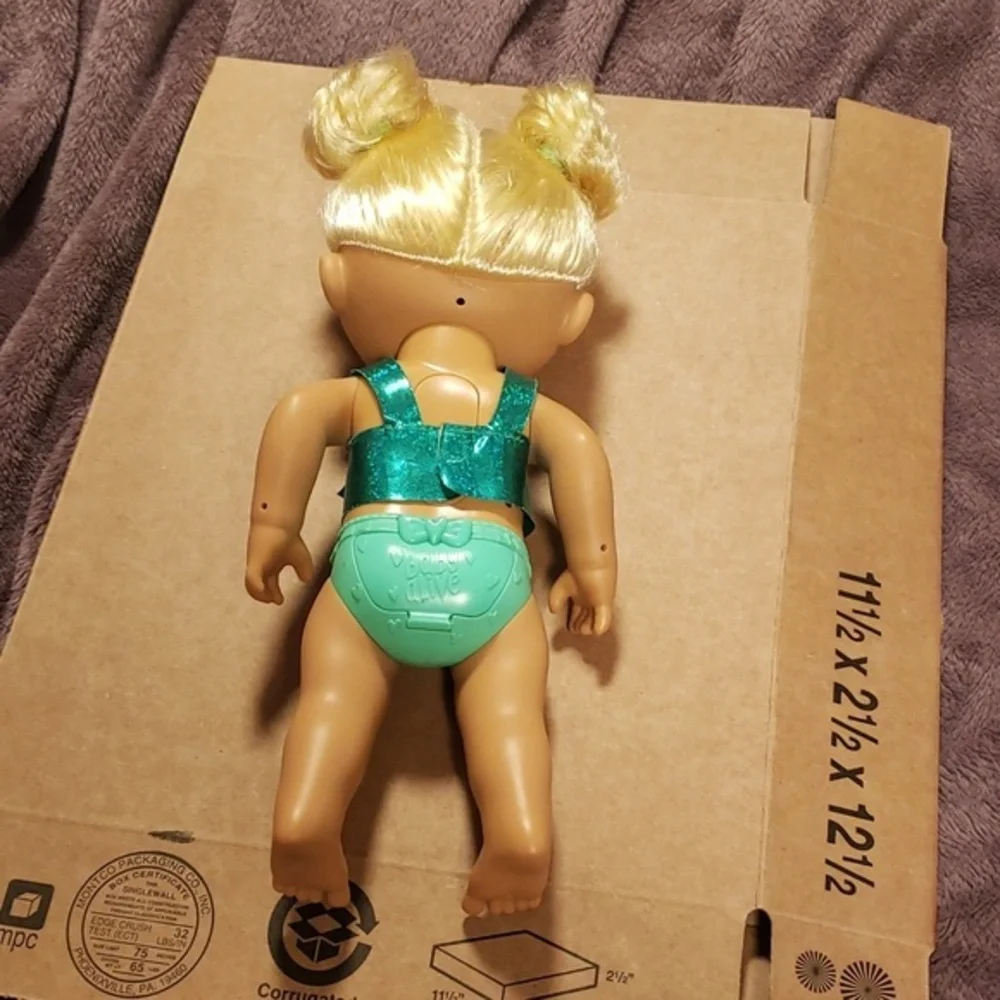 Baby Alive gently played